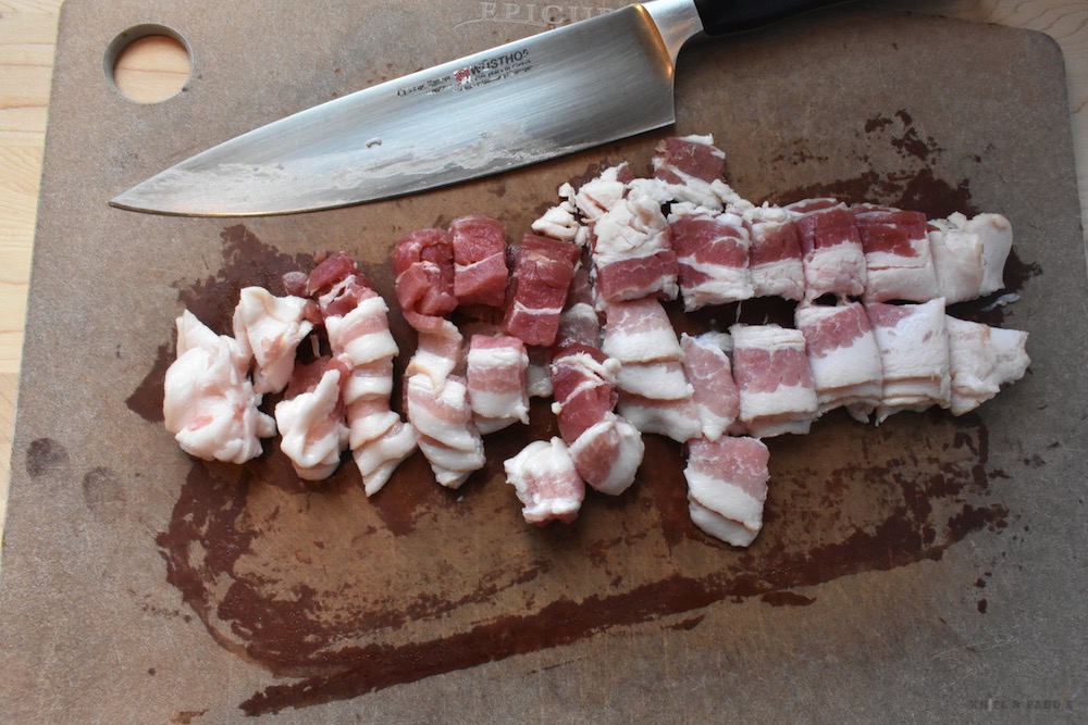 Sliced bacon on cutting board
