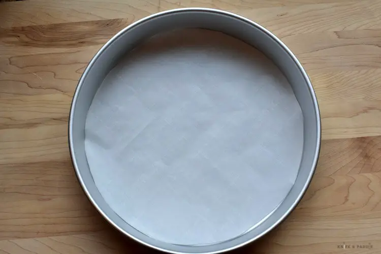 Cake pan lined with parchment paper