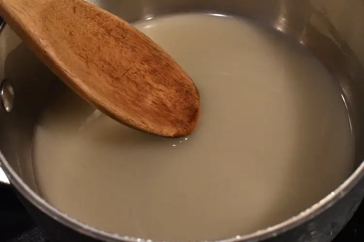Making fruit glaze in a pan
