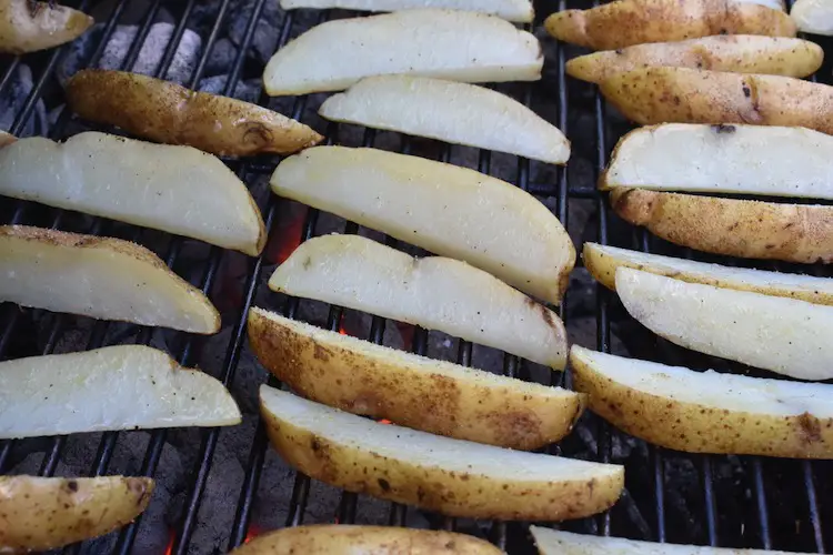 Potatoes cooking on grill