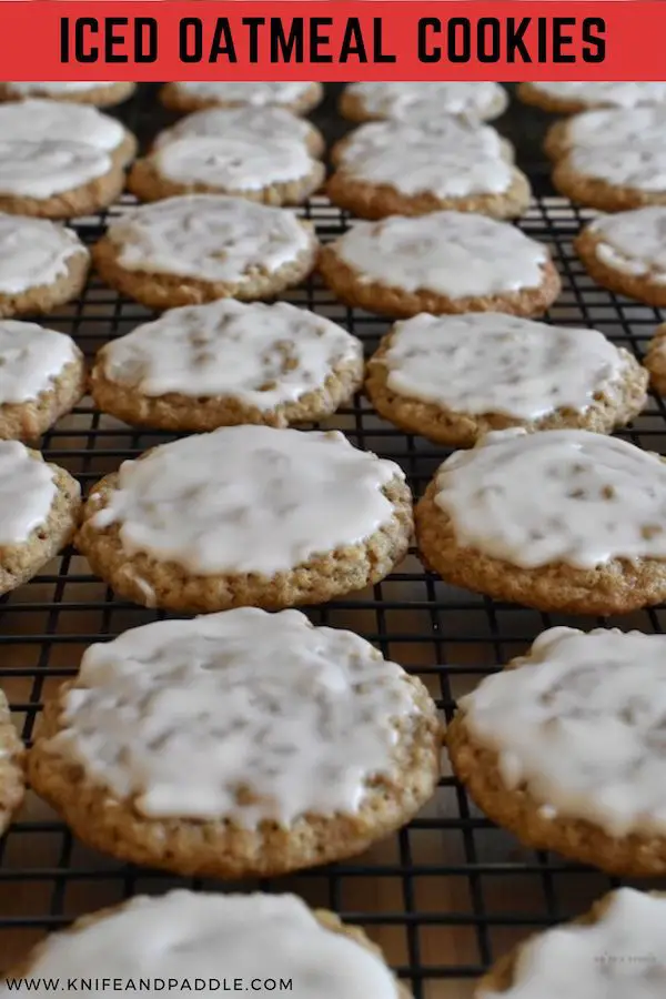Iced oatmeal cookies on cooling rack