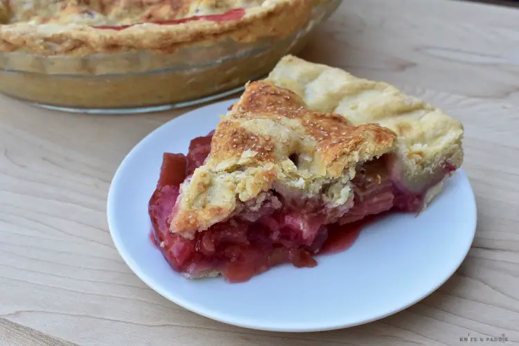 Slice of strawberry rhubarb pie