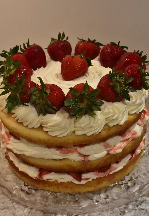 Strawberry shortcake cake on a plate