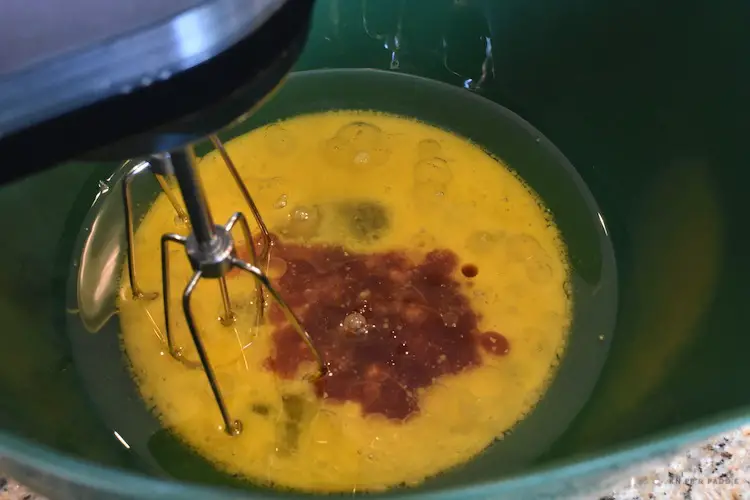 Eggs, oil and vanilla in mixing bowl