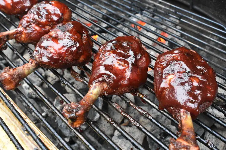 The Best Memorial Day Recipes:  Chicken with BBQ sauce on grill
