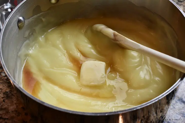 Butter, coconut and vanilla extract to the pudding