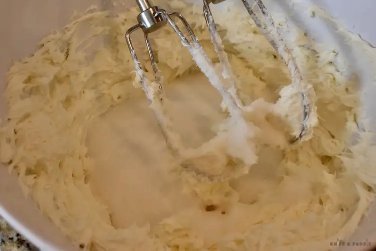 Beating the cream cheese and sugar