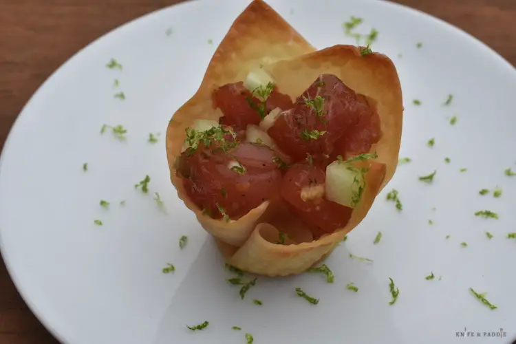 Tuna tartare in wonton bowl on a plate
