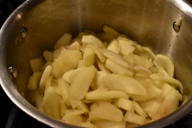 Apples in saucepan