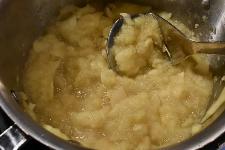 Mashed apples in saucepan