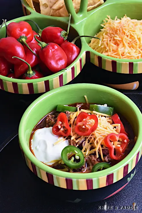 chili in bowl with toppings