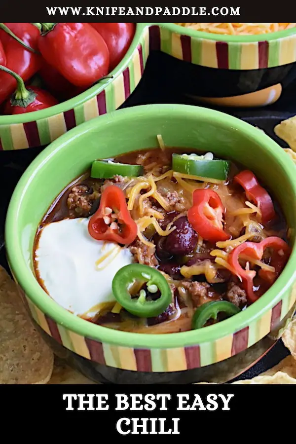 Ground beef, beans , cheese,peppers and sour cream in a bowl