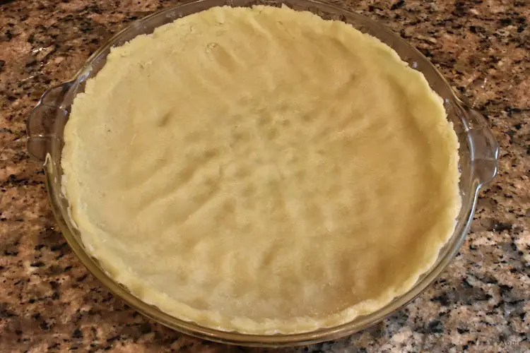 Dough into the pie plate
