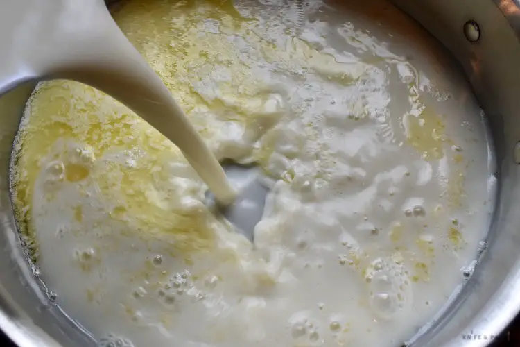 Adding flour and milk mixture to the melted butter