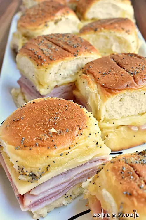 Little game day sandwiches with melted Swiss 