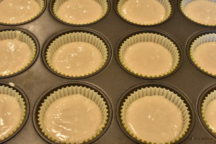 Filling the cupcake liners with batter