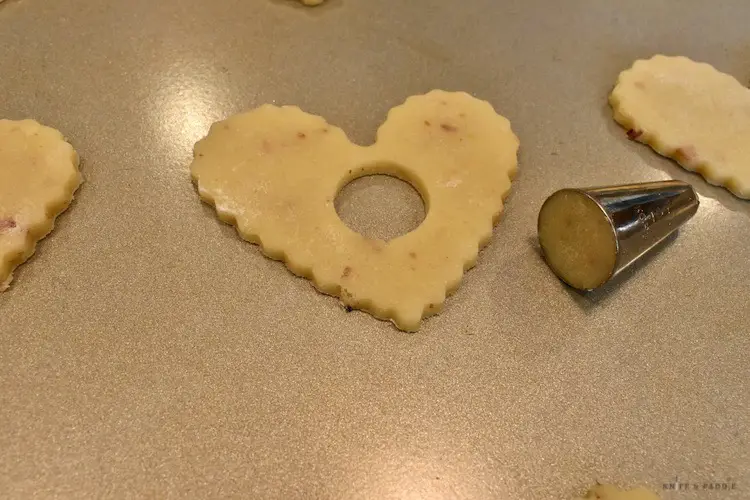 Heat cookie cutter with hole cutout