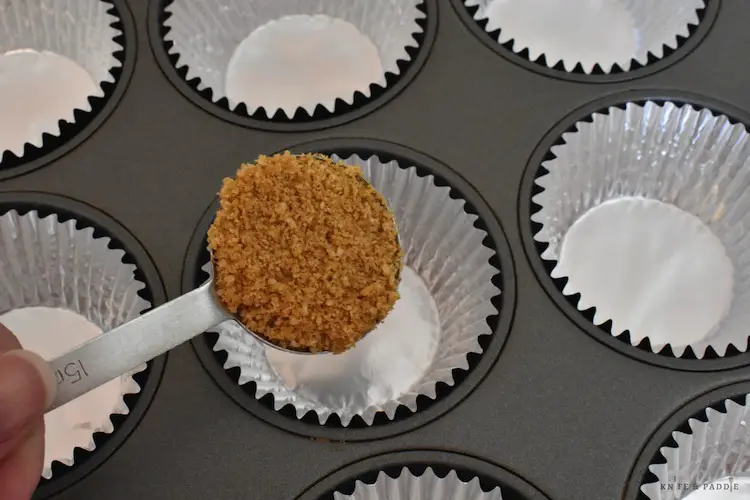 Graham cracker crumbs in a muffin liner