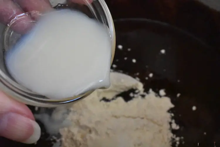 Adding milk to the batter