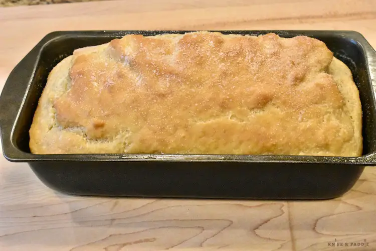 Bread out of the oven in a loaf pan