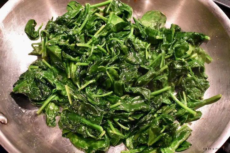 Sautéed spinach in the frying pan