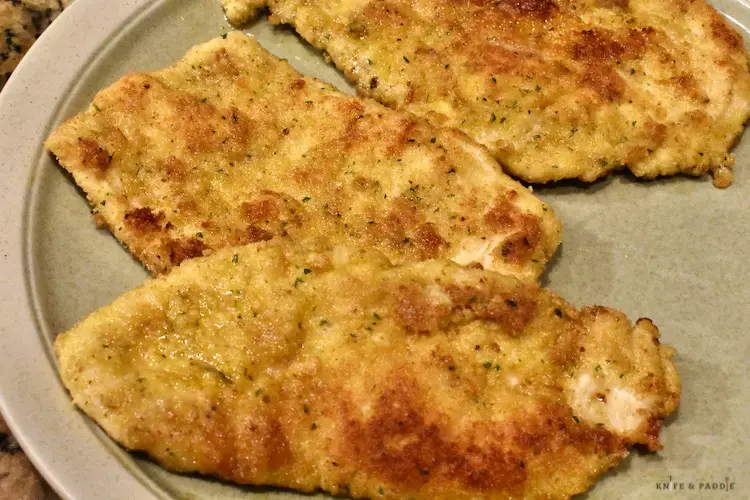 Plated fried chicken breasts