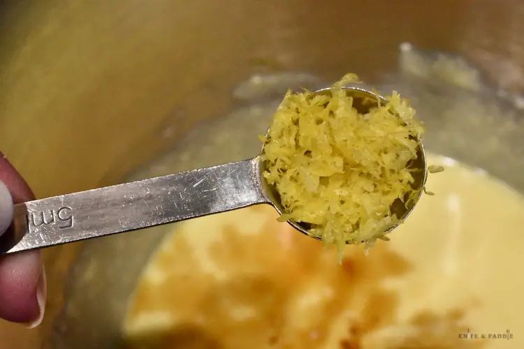 Adding lemon zest to the zeppole batter