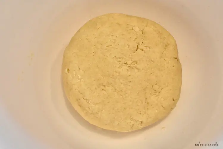Dough disk in a mixing bowl