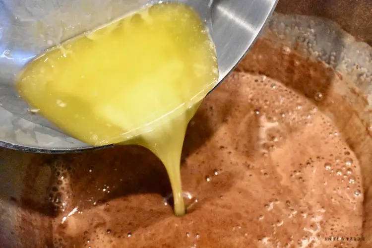 Eggs, vanilla, sugar, unsweetened cocoa, salt, evaporated milk and butter in a mixing bowl