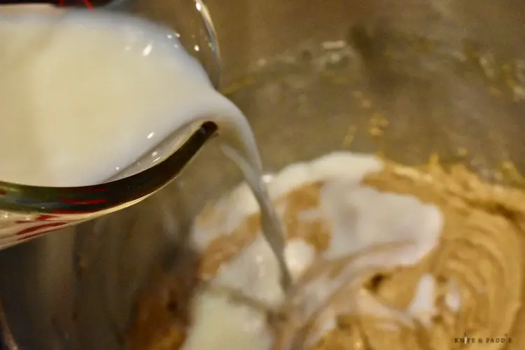Adding half the buttermilk to the batter