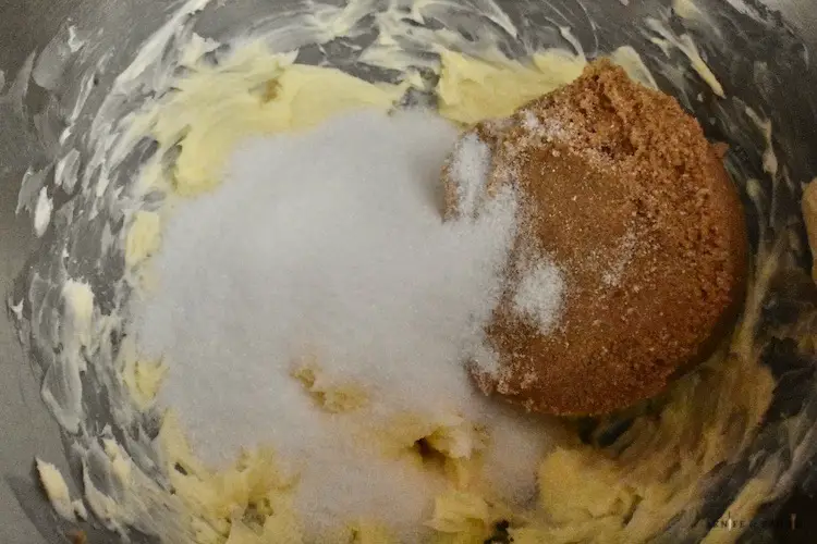 Butter, sugar and brown sugar in a mixing bowl