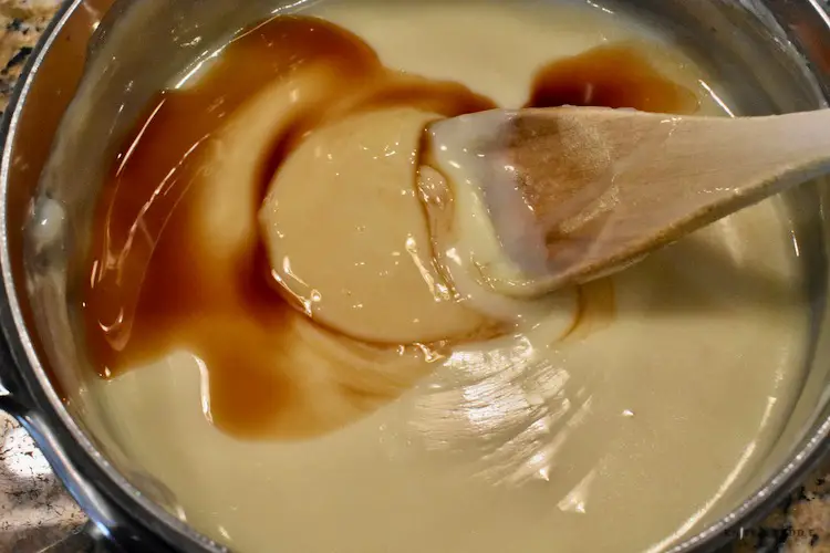 Heated butter and sweetened condensed milk in a small saucepan with pure vanilla extract