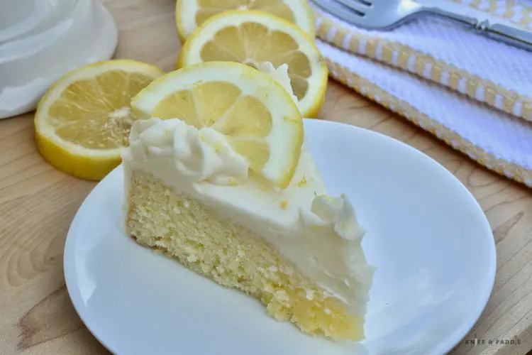 Light Lemon Cake with Cream Cheese Frosting slice on a plate