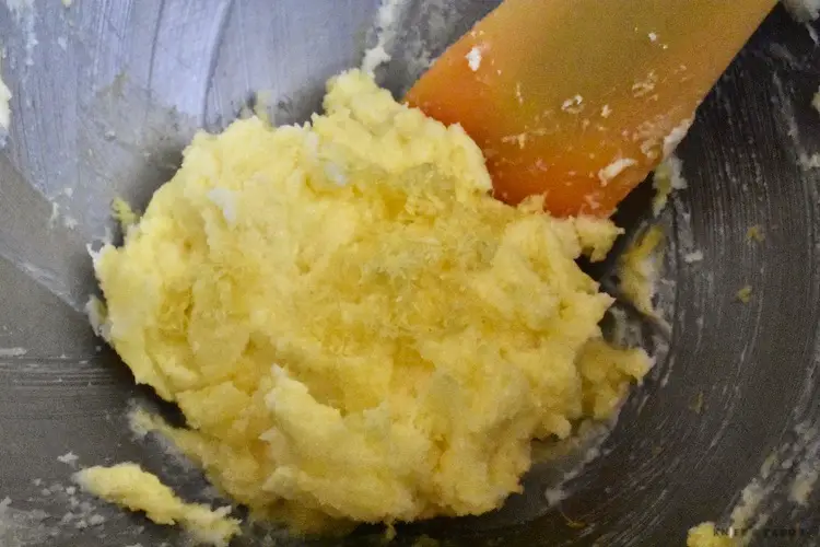 Creamed butter, sugar, egg yolks and lemon rind in a mixing bowl