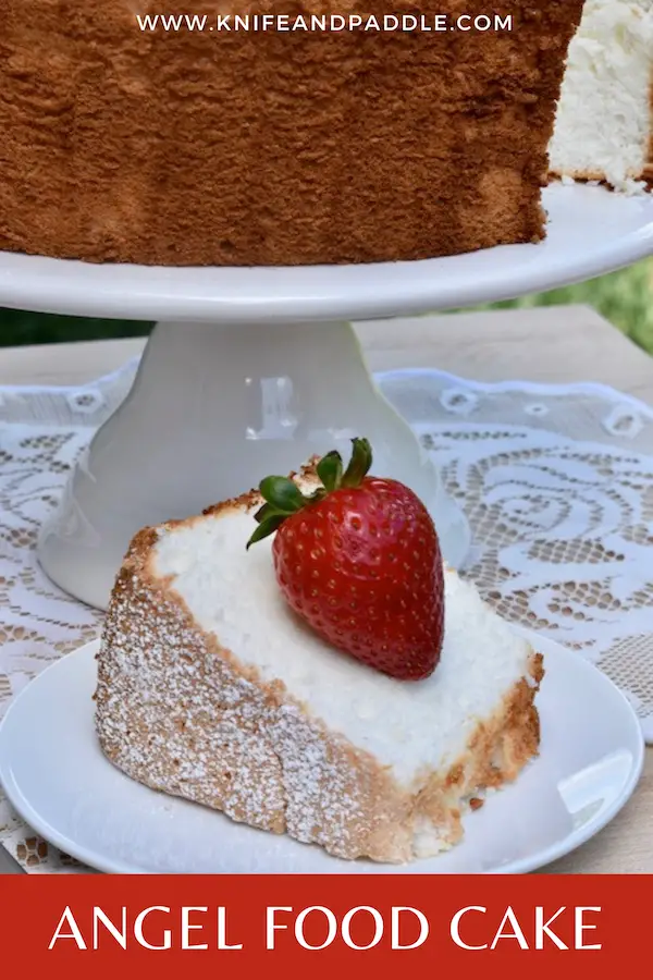 Angel Food Cake on a cake stand and slice plated