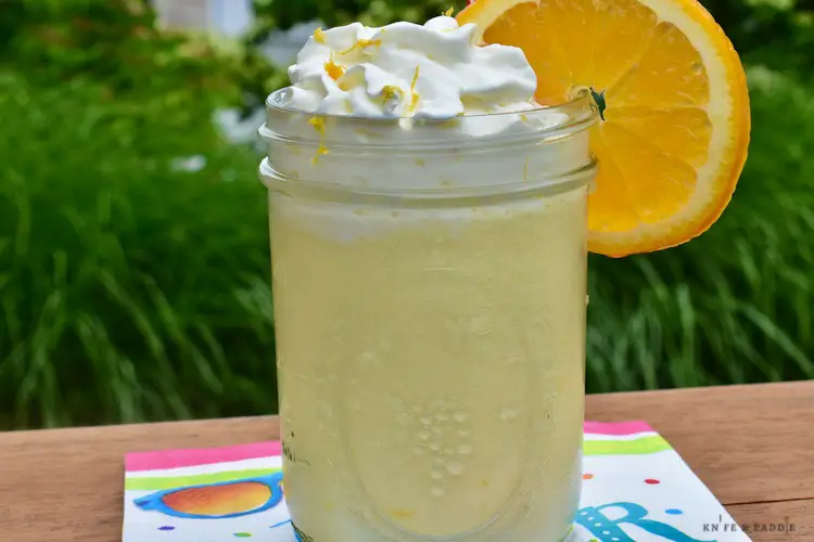 Frozen Creamsicle Cocktail in a mason jar