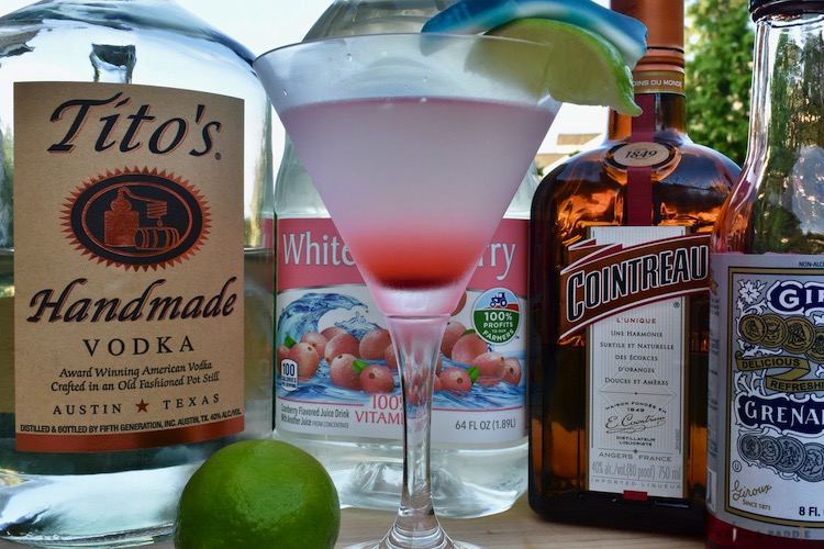 Vodka, white cranberry, Cointreau, grenadine syrup, lime, gummy shark and lime wedge, Great White Shark Cocktail