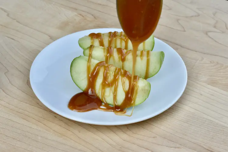 Easy Homemade Caramel Sauce drizzled over apples
