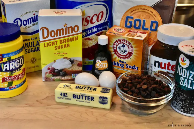 Corn starch, granulated sugar, light brown sugar, vegetable shortening, flour, baking soda, Nutella, salt, chocolate chips, eggs, butter and pure vanilla extract.
