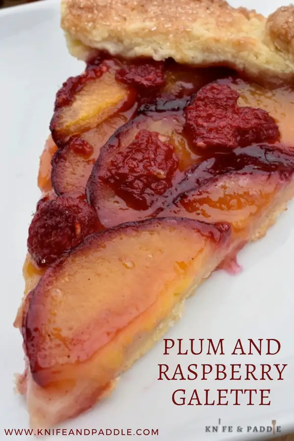 Plum and Raspberry Galette slice on a plate