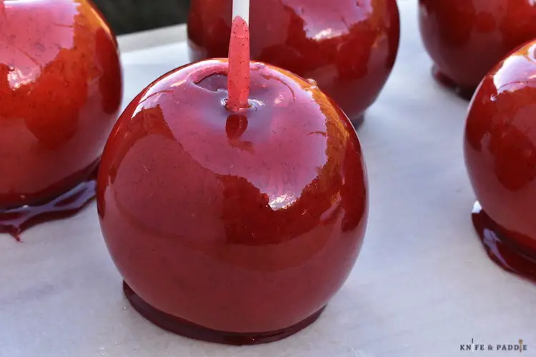 Candy apples on parchment paper