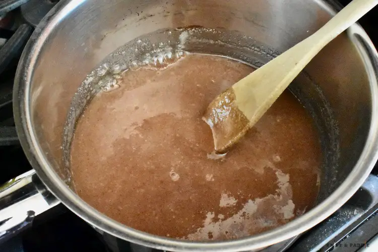 Sugar, cinnamon, water and light Karo syrup in a saucepan
