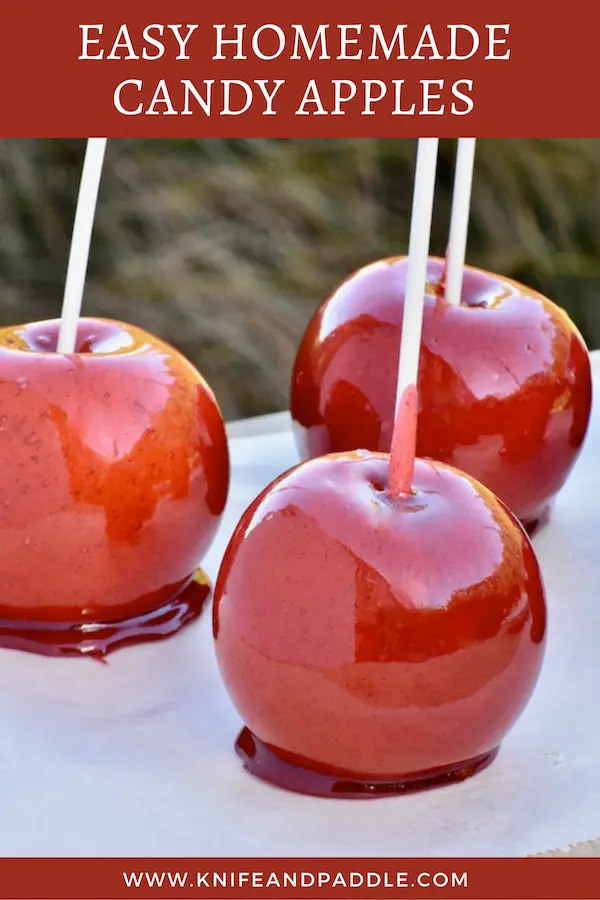 Easy Homemade Candy Apples on parchment paper