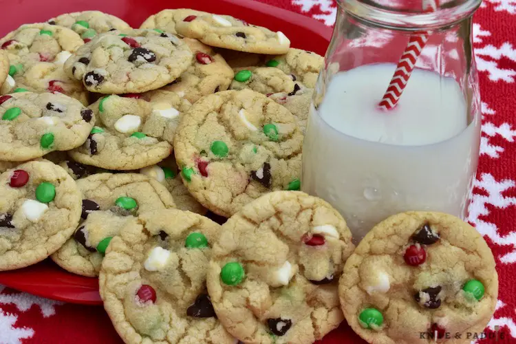 Chocolate Chip Christmas Cookies on a plate with a cup of milk 