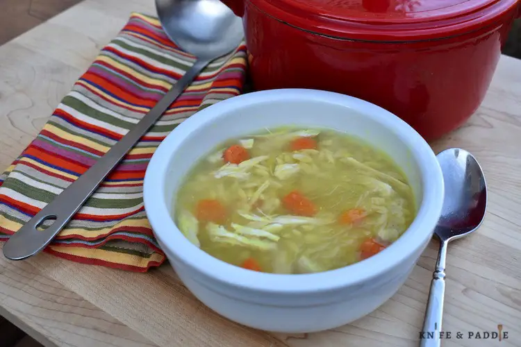 Homemade Chicken Soup with orzo in a bowl