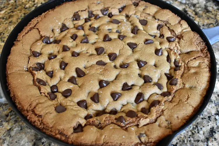 Warm chocolate chip cookie in a skillet