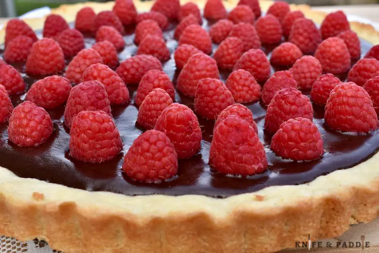 Fresh raspberries on a golden brown pastry