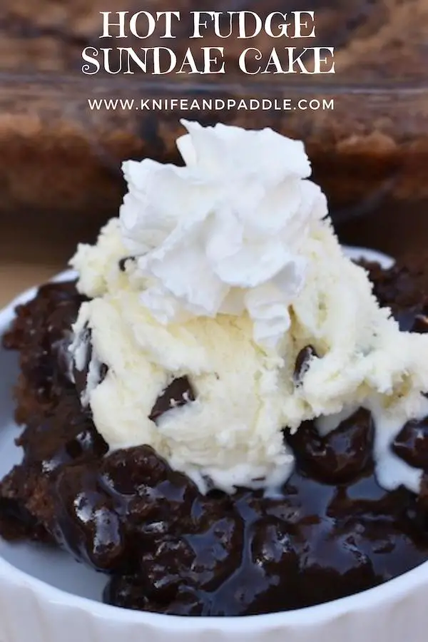 Easy Hot Fudge Sundae Cake with ice cream and whipped cream In a bowl