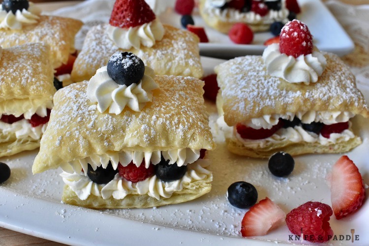 Mixed Berry Cream Puffs on a plate