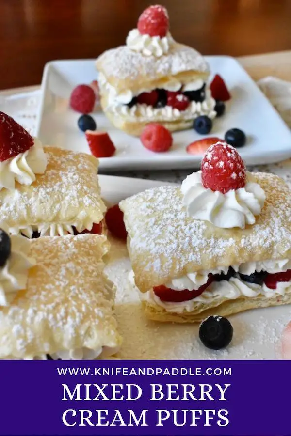 Raspberries, blueberries, raspberries with puffed pastry and cream